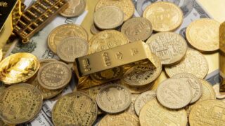 Цена на золото незначительно растет перед результатами заседания ФРС США