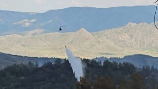 Тушение пожара в горах ВКО продолжается при помощи вертолётов