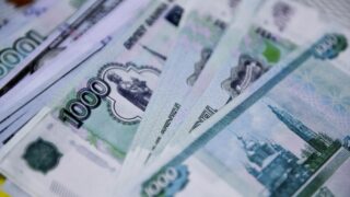 Сколько составляет доля национальных валют в расчетах России и Казахстана в первом полугодии