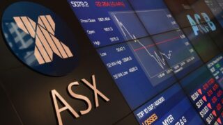 Австралийские акции закрылись с повышением после торгов