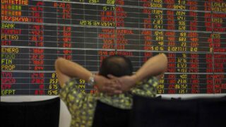 Азиатские акции падают на фоне неопределенности в отношении снижения ставки, низкого уровня ВВП Китая; Nikkei растет