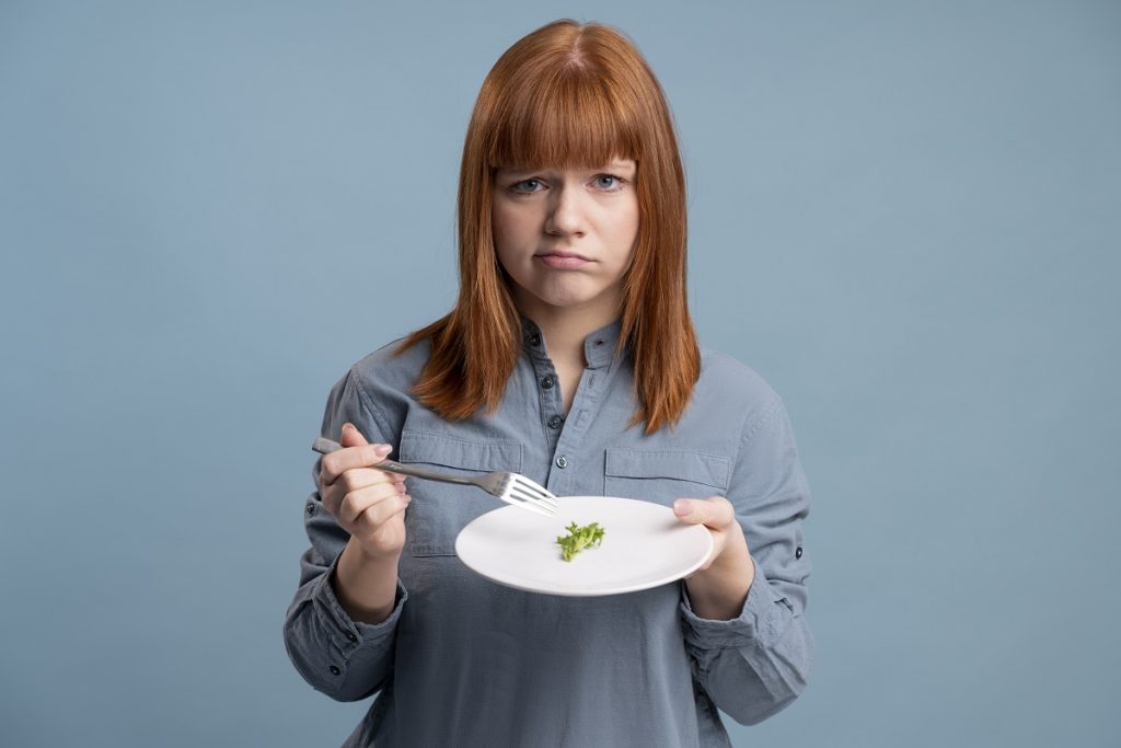 person with eating disorder trying eat healthy - Bizmedia.kz