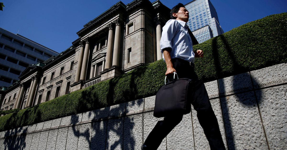 A man runs past the Bank of Japan (BOJ) building in Tokyo