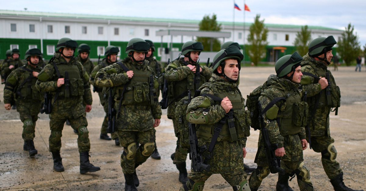 Russian reservists attend a ceremony before deployment to military units, in Rostov region